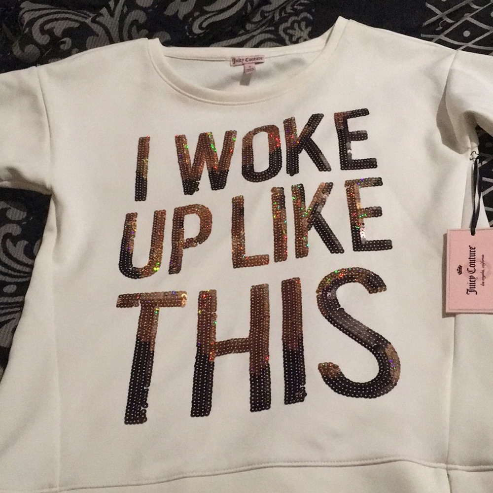 A white soft sweatshirt with holographic glitters